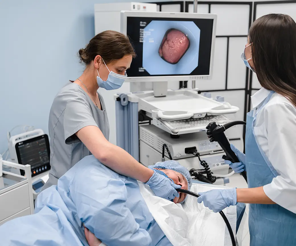 doctor-using-a-fiberoptic-scope-at-